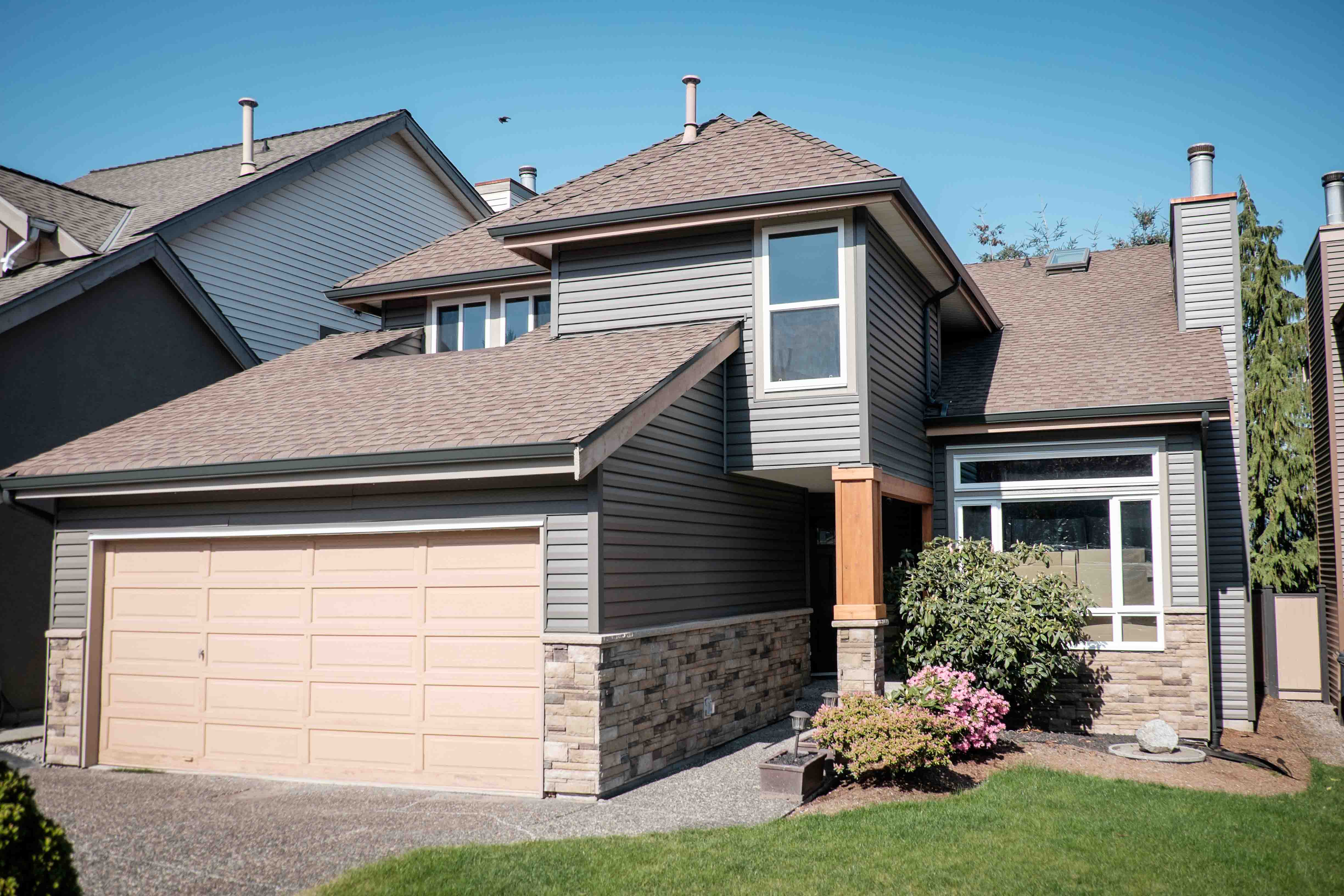 Coquitlam home after replacement windows and exterior renovation
