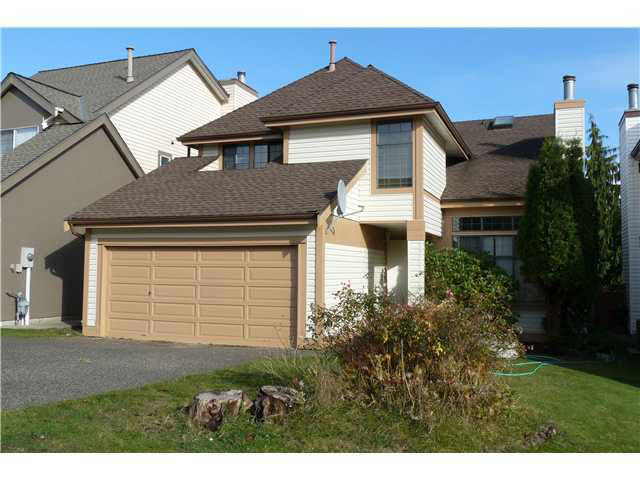 Coquitlam home before replacement windows and exterior renovation